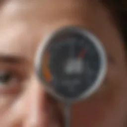 Close-up of a digital forehead thermometer in action