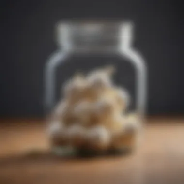 Close-up of garlic pills in a glass container